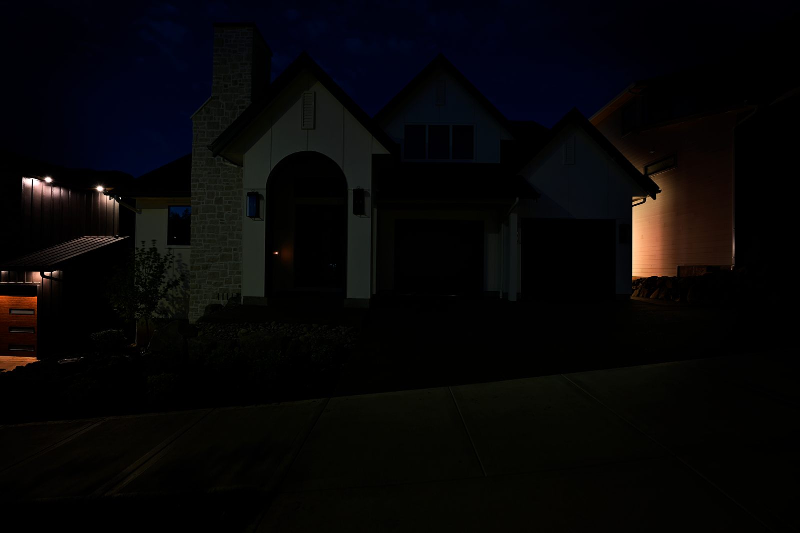 Same home at night with lights off, before permanent LED install